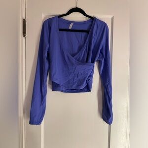Athleta long-sleeve and bright purple workout top